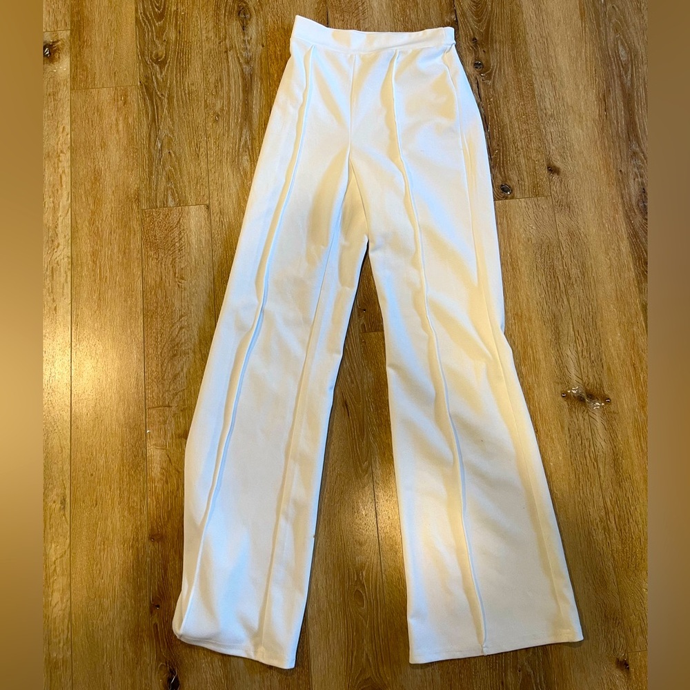 White flared pants